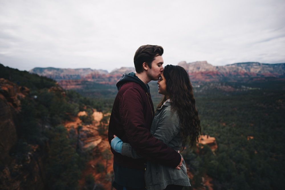 Couple connecting and sharing an intimate moment out in nature 